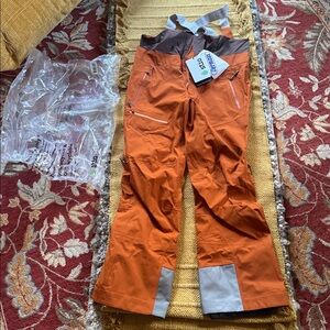 Stio Environ Bib Women’s ski bibs pants saddle rust orange size large reg NEW